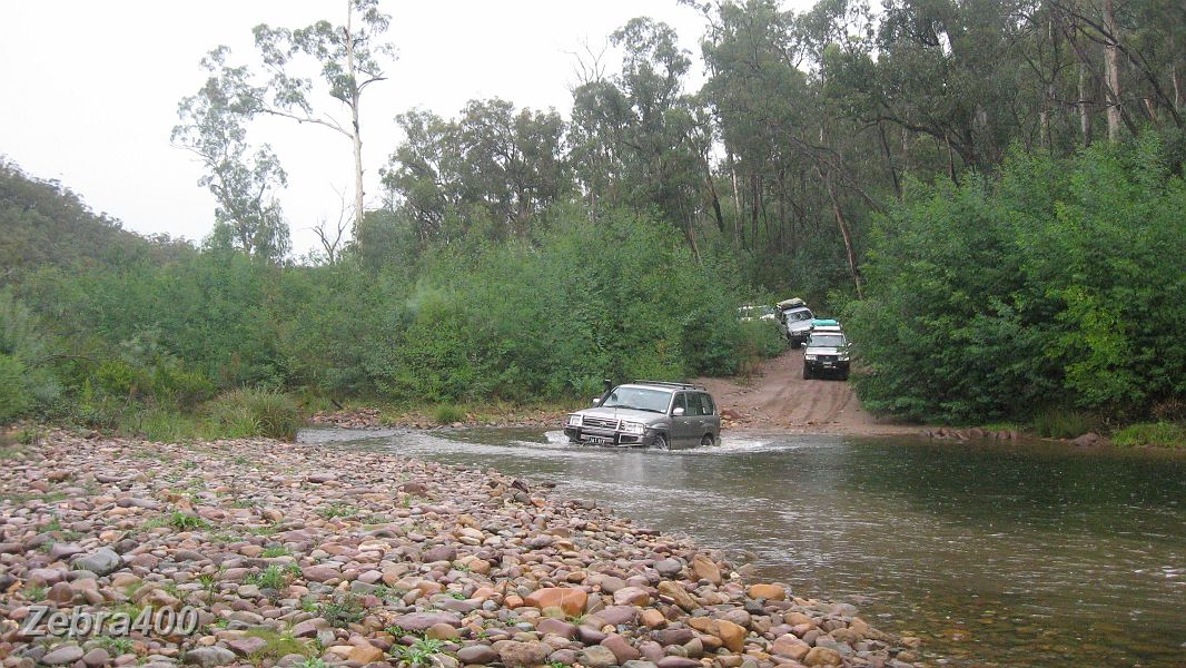 02-JAT brings the rest of the convoy through Ben Cruachan Creek.JPG